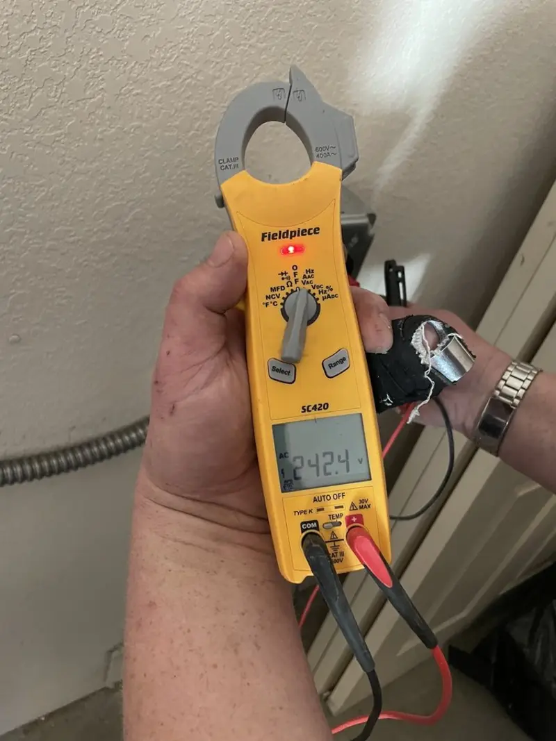 Voltage testing with clamp meter during Generator Installation in Elizabeth